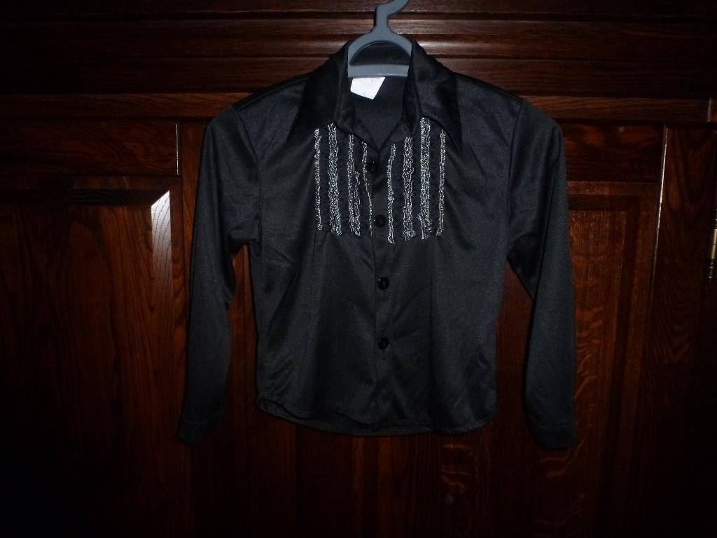 1 mooie zwarte rouches of disco blouse lange mouwen maat 116, Kinderen en Baby's, Carnavalskleding en Verkleedspullen, Ophalen of Verzenden