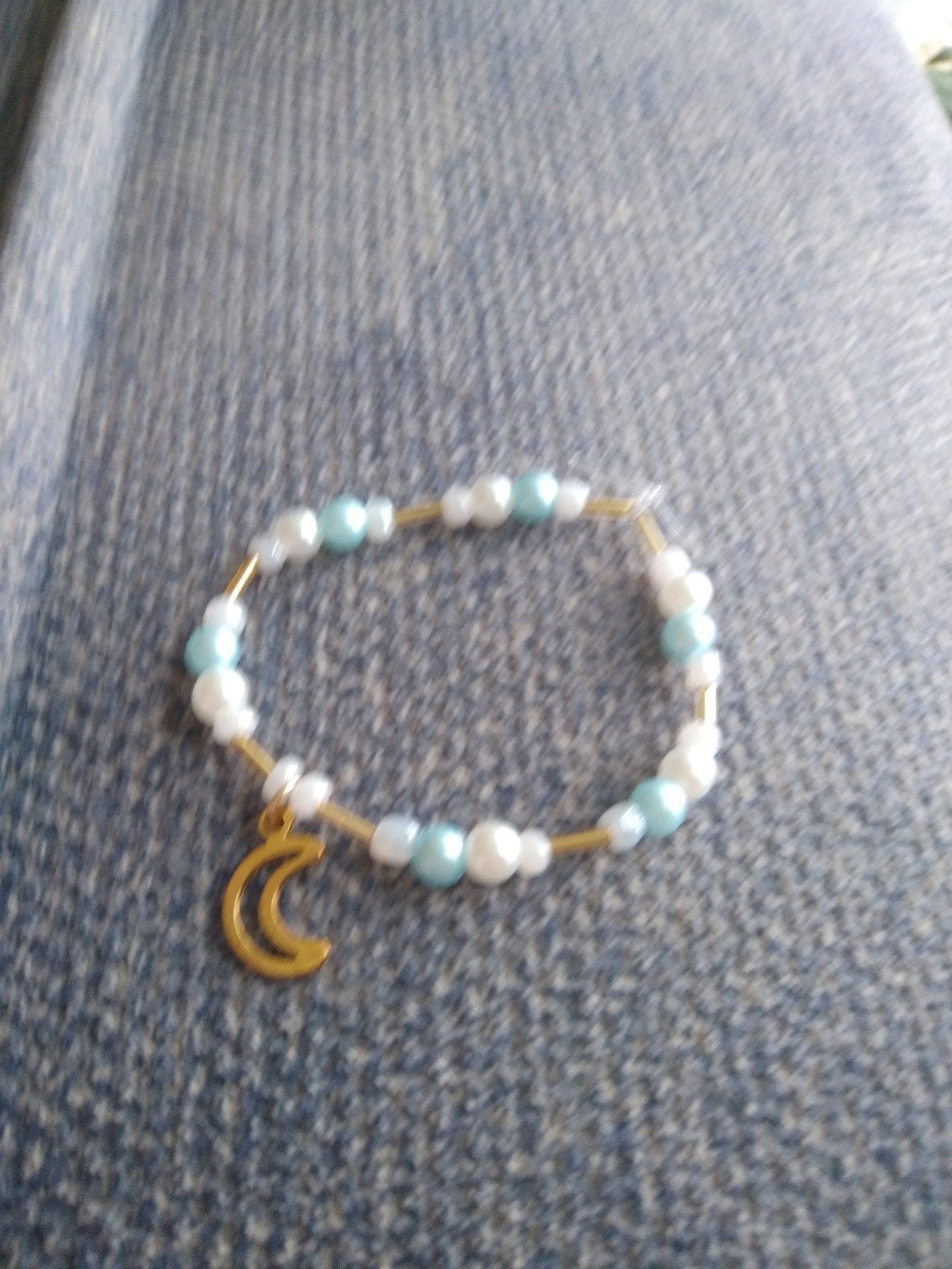 armband met maan bedeltje, Overige materialen, Overige kleuren, Verzenden, Zo goed als nieuw