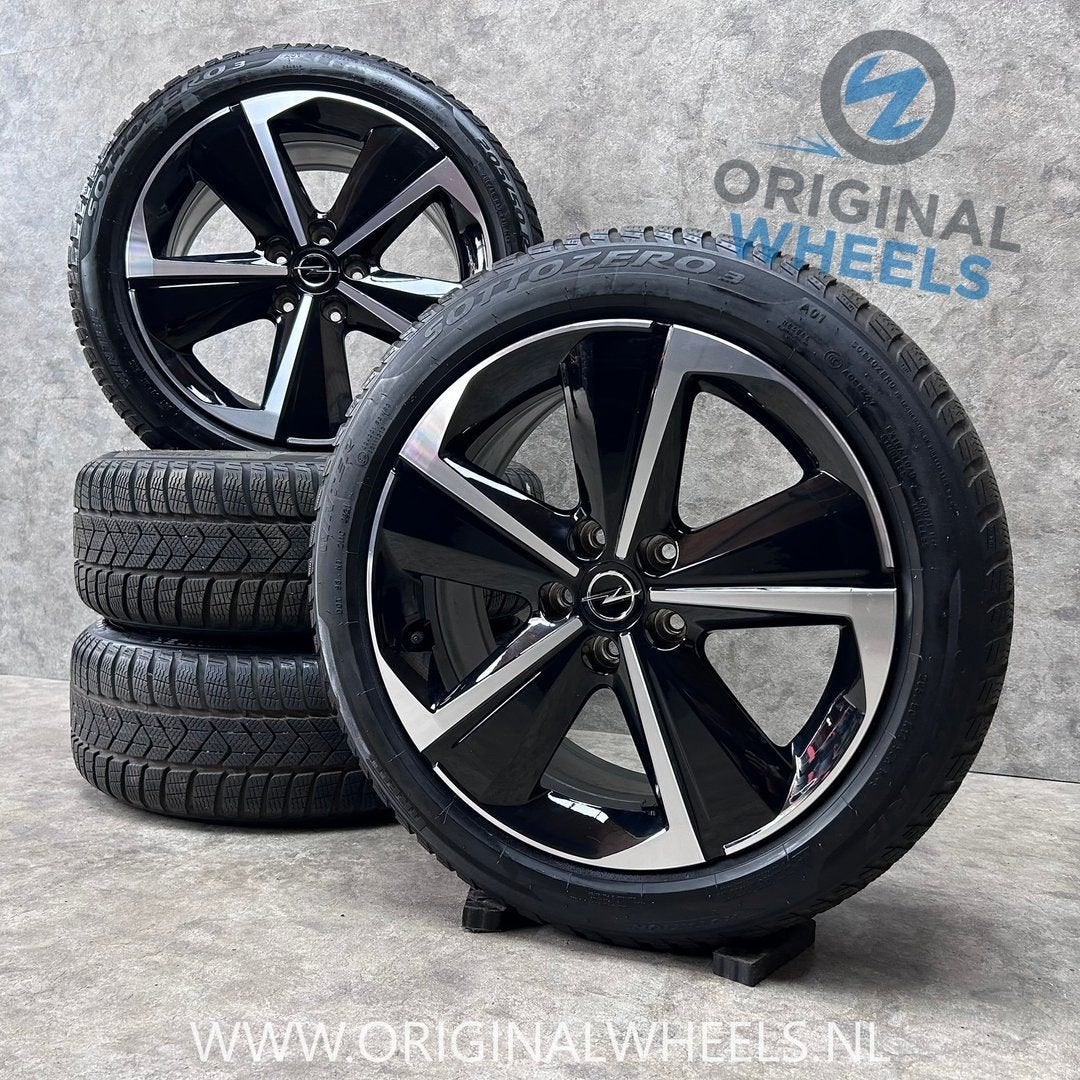 DIV. 17 inch originele velgen + winterbanden Opel Astra L