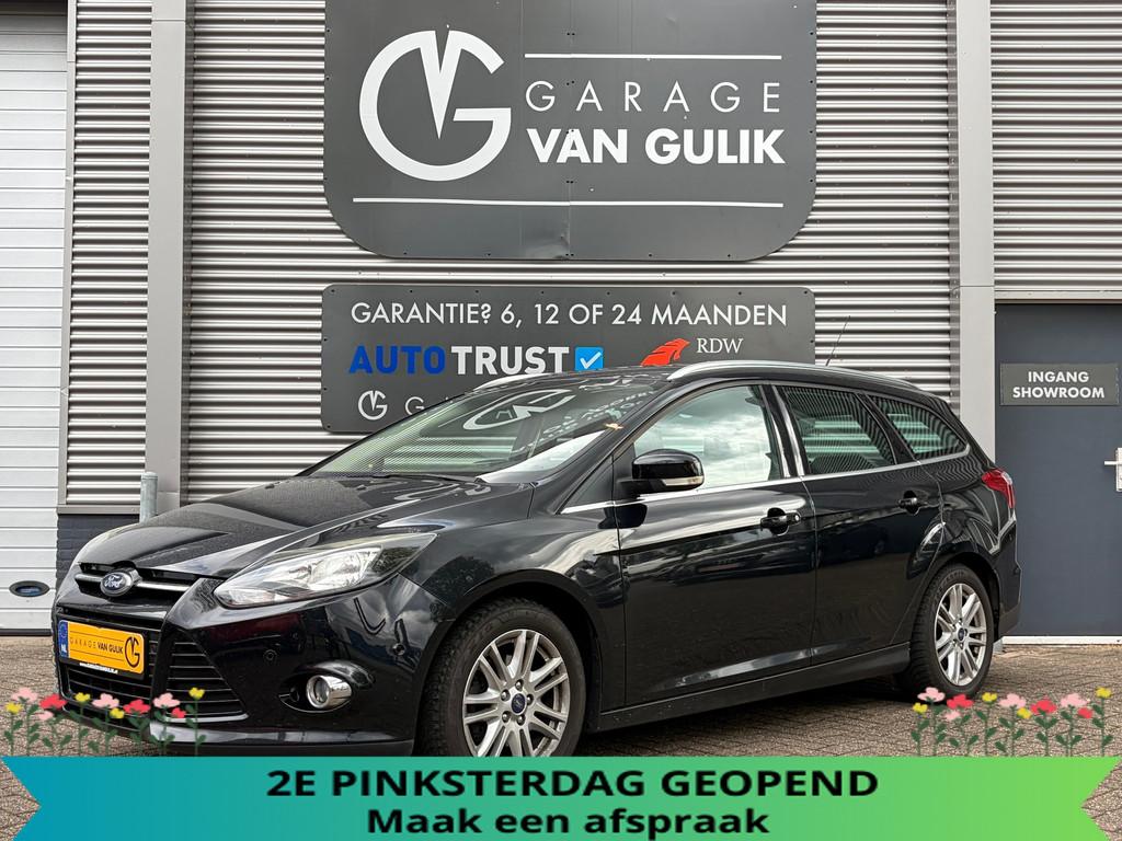 Ford Focus Wagon 1.0 101PK Trekhaak,Navi,Clima,CruiseControl, Auto's, Euro 5, Gebruikt, Zwart, Origineel Nederlands