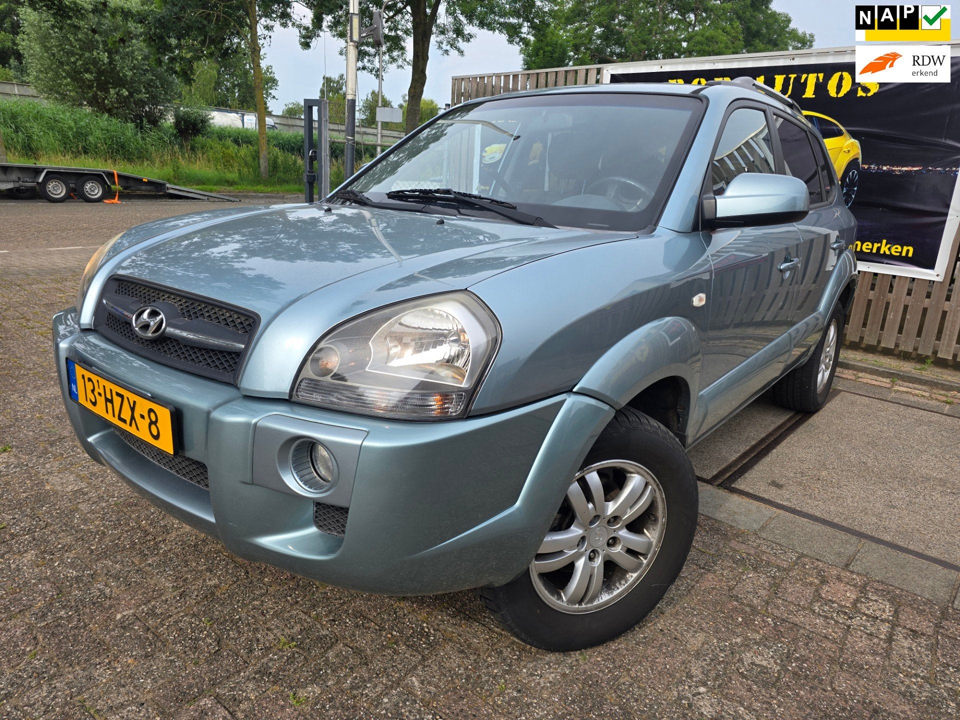 Hyundai Tucson 2.0i Style Supreme/2e eigenaar/nap/trekhaak/a, Auto's, Stoelverwarming, Gebruikt, 4 cilinders, Handgeschakeld