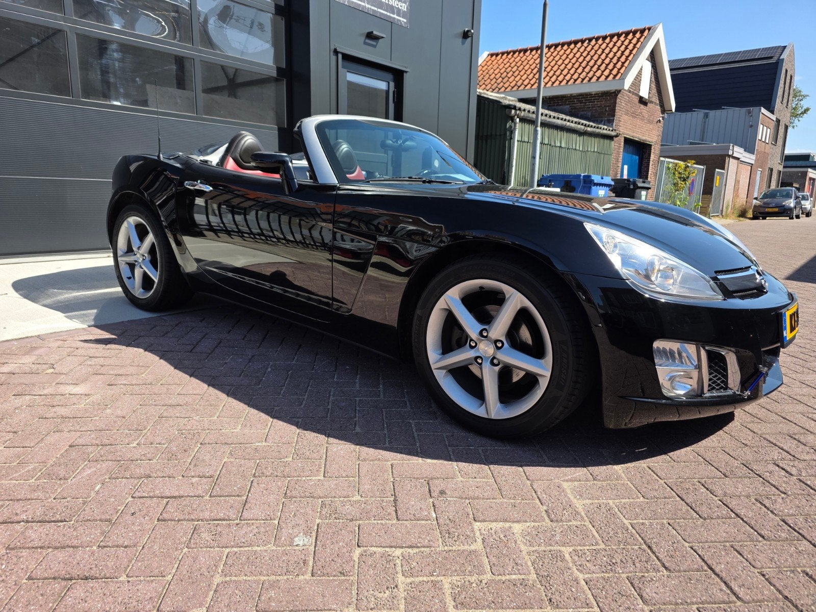Opel GT 2.0 Turbo 2008 Zwart 82800km, Auto's, 1998 cc, Achterwielaandrijving, 264 pk, 4 cilinders