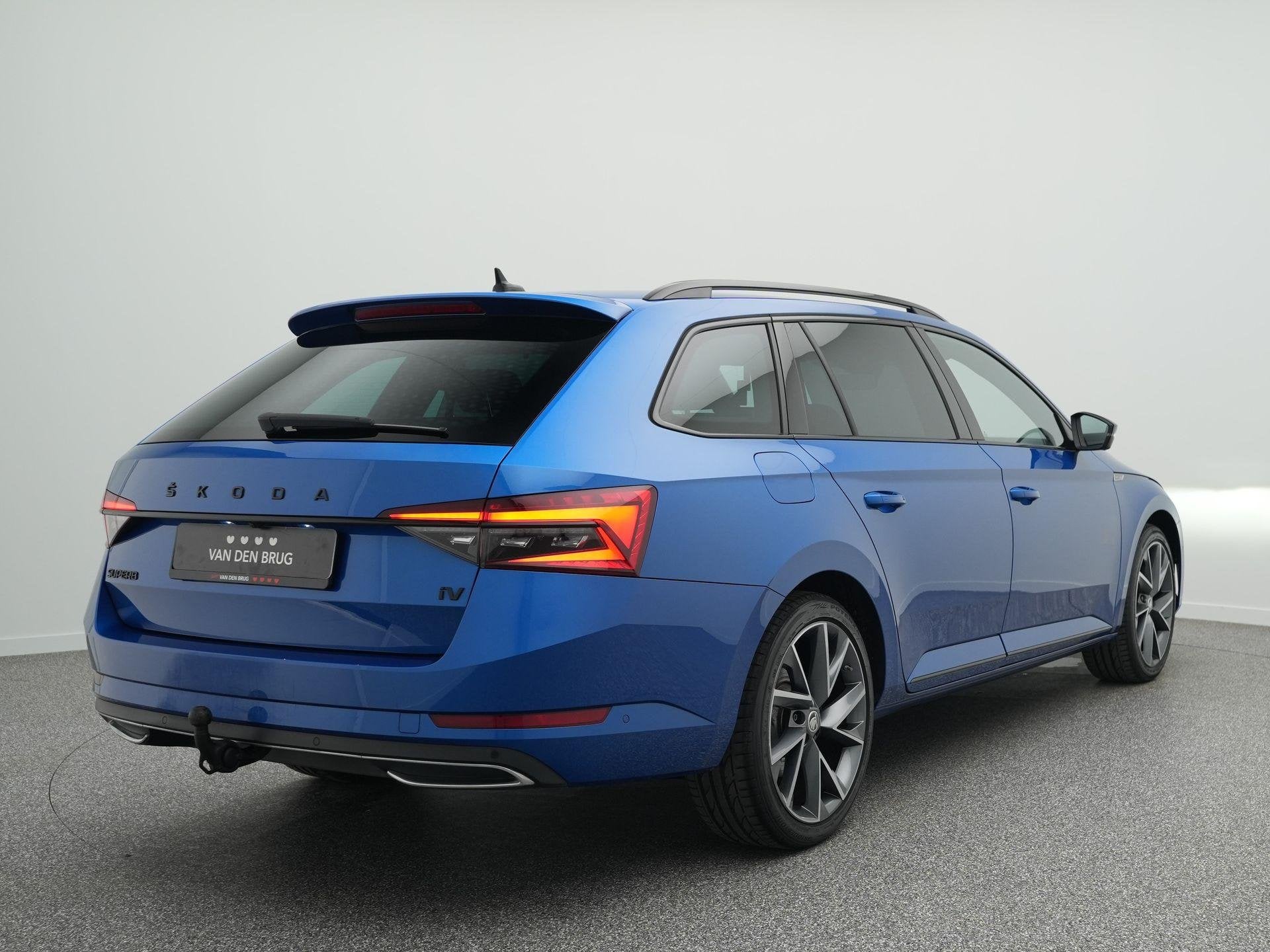 Skoda Superb Combi 1.4 TSI 218pk iV Sportline Business | Tre, Auto's, Gebruikt, 4 cilinders, Blauw, Alcantara