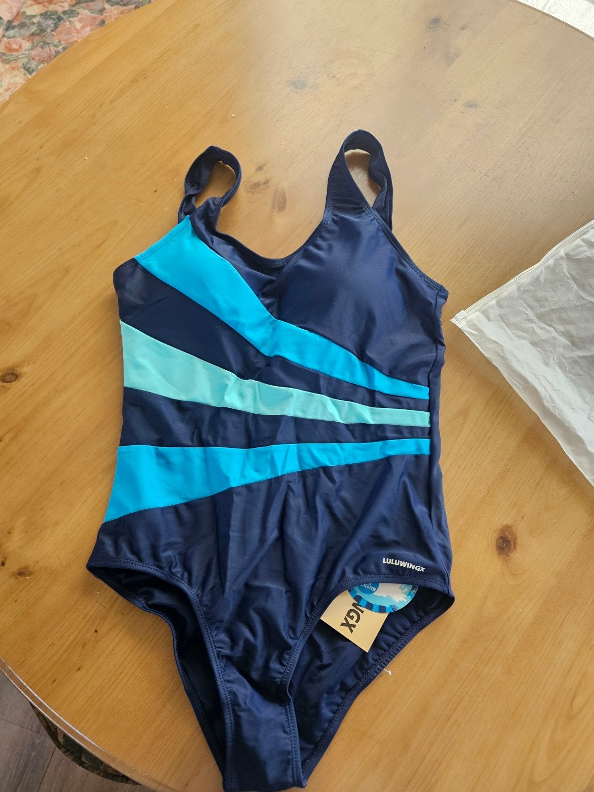 Nieuw kinderbadpak - Donkerblauw met turquoise strepen, Kinderen en Baby's, Nieuw, Overige maten, Ophalen of Verzenden, UV-zwemkleding