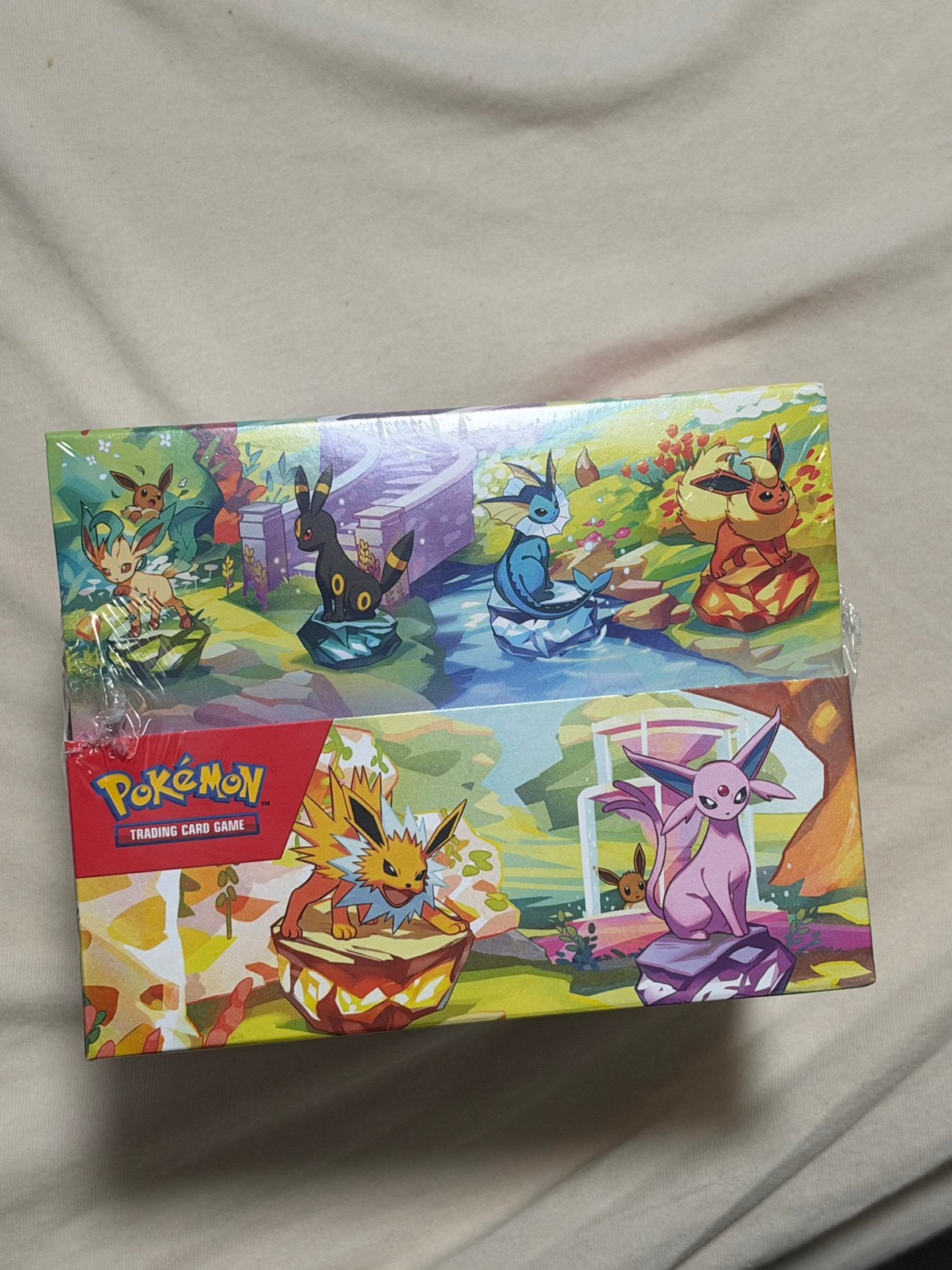 Pokemon prismatic evolutions mini tin display, Ophalen of Verzenden, Zo goed als nieuw