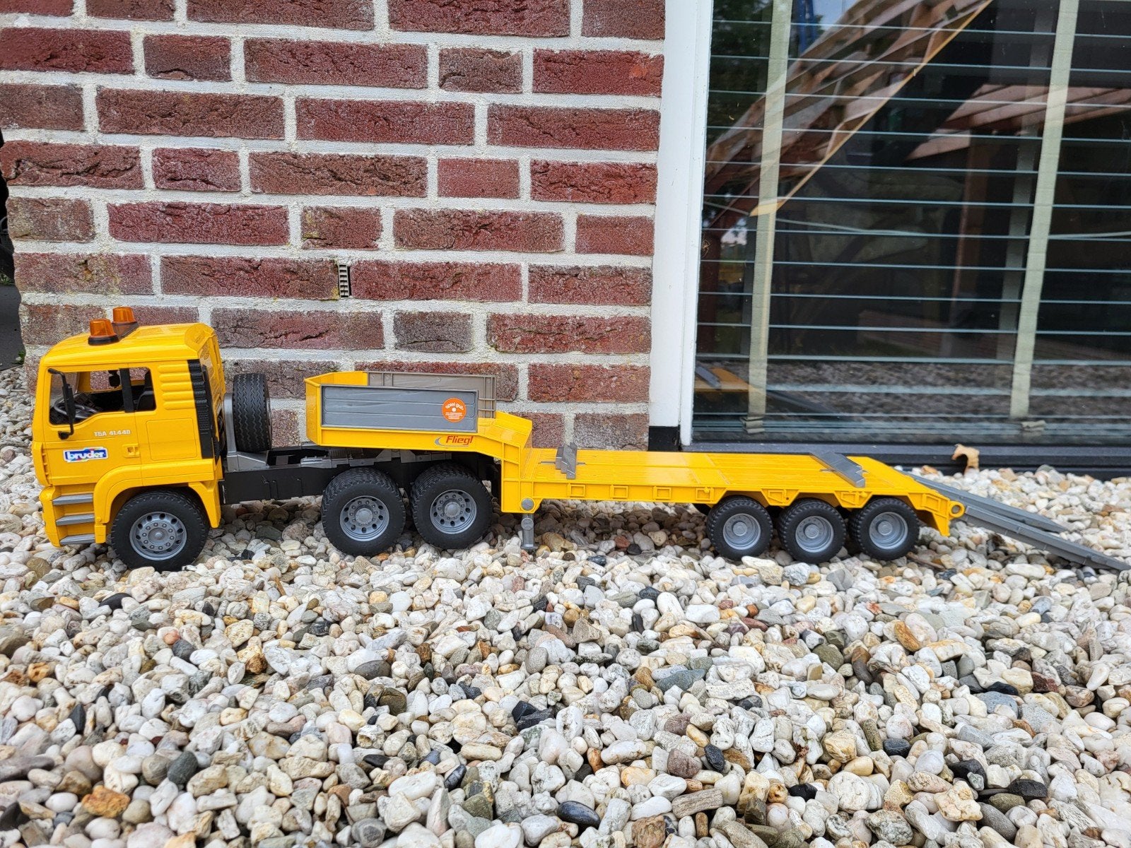 Bruder MAN Vrachtwagen met Dieplader, Ophalen, Gebruikt