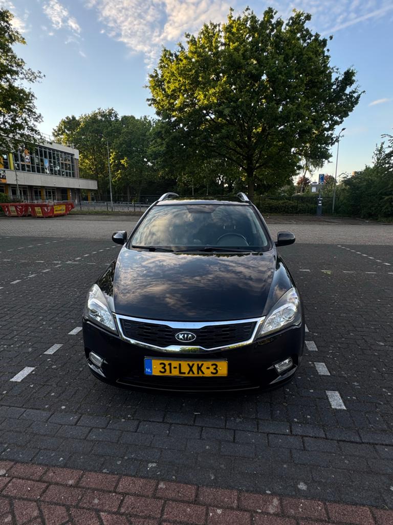 Kia (Pro) Cee d 1.4 Sporty Wagon 2010 Zwart, Auto's, Kia, Voorwielaandrijving, 4 cilinders, 1396 cc, Zwart