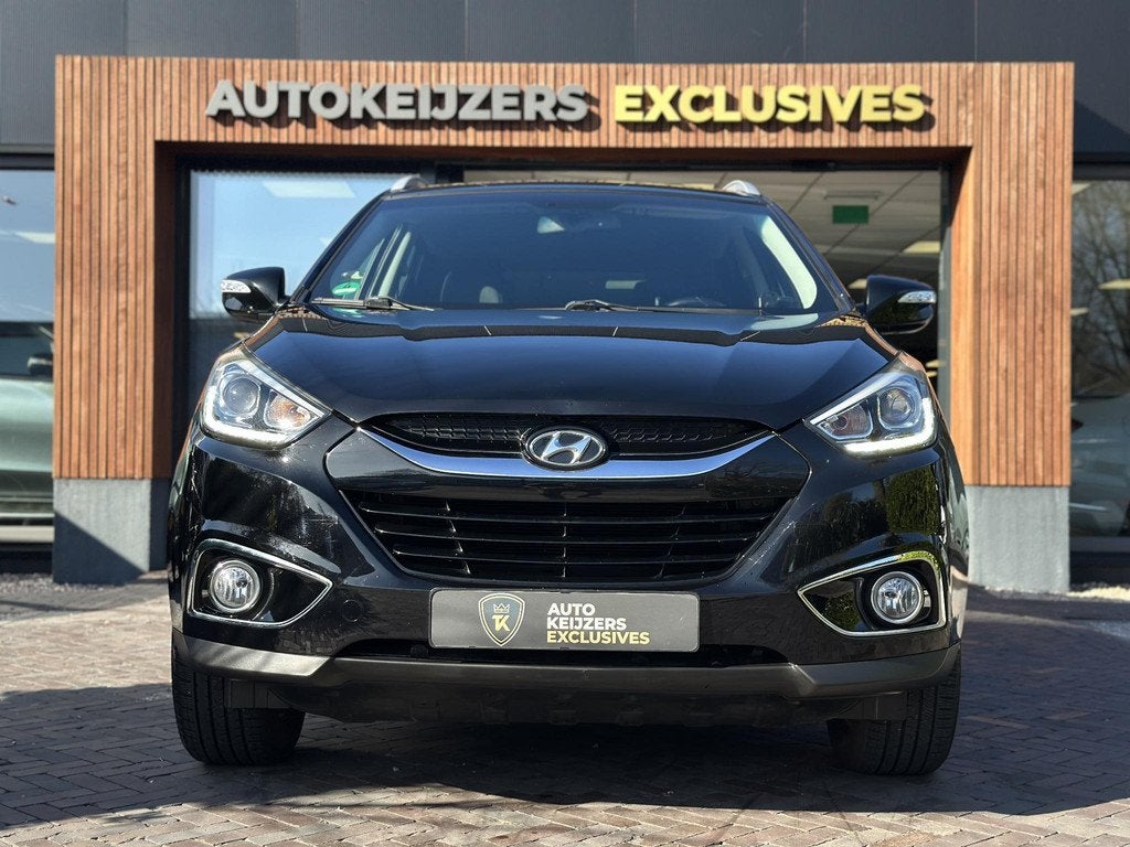 Hyundai ix35 2.0i i-Motion Cruise Clima Stoelverwarming Auto, Euro 5, Gebruikt, 4 cilinders, Leder en Stof