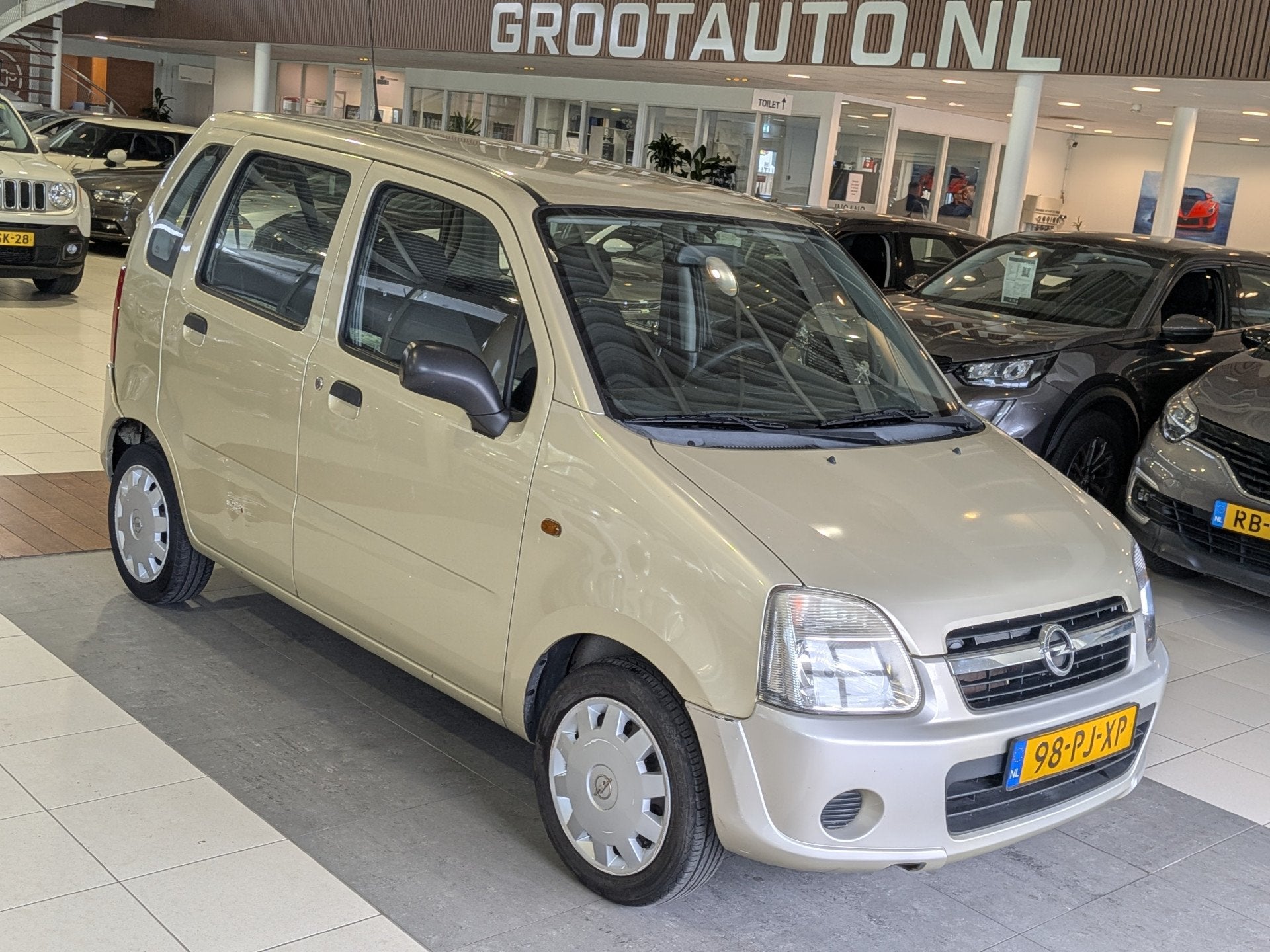 Opel Agila 1.2-16V Essentia Stuurbekrachtiging (bj 2004), Auto's, Voorwielaandrijving, Stof, Bedrijf, Handgeschakeld