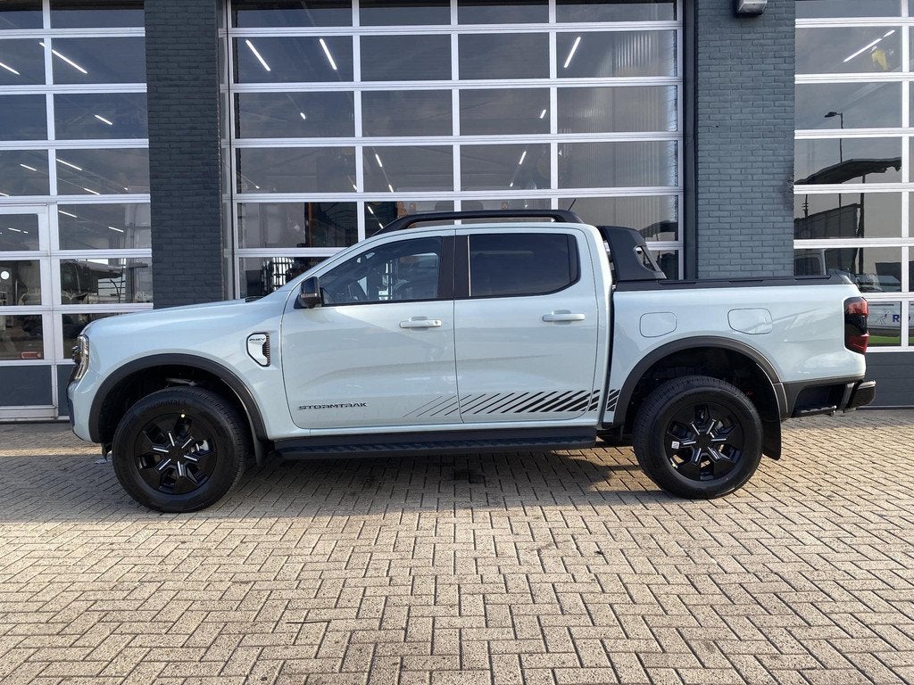 Ford Ford Ranger Stormtrak Double Cabine 2.3 PHEV 279PK Ford, Auto's, Ford, Automaat, Stof, 4 cilinders, 2300 cc