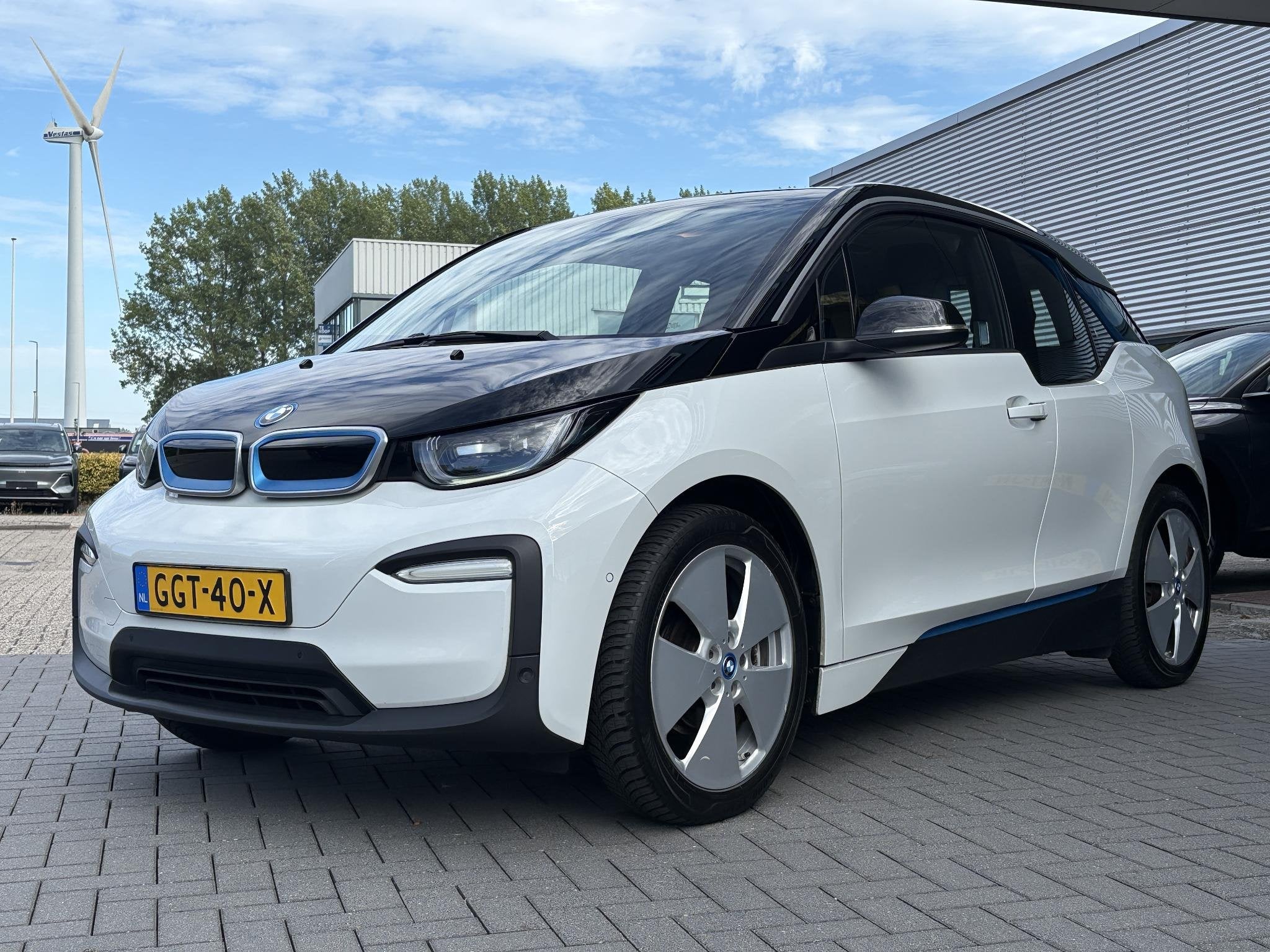BMW i3 Basis 120Ah 42 kWh 170pk | Stoelverwarming | Navi | A, Auto's, BMW, Automaat, Gebruikt, 4 stoelen, 258 min