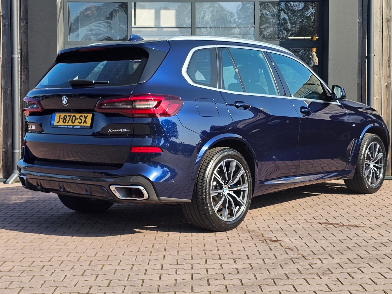 BMW X5 xDrive45e High Executive M-Sport | Luchtvering | Elek, Auto's, BMW, Gebruikt, 398 pk, Met garantie (alle), Blauw