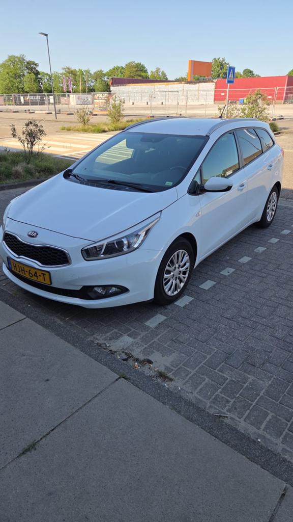 Kia (Pro) Cee d 1.4 Cvvt Sporty Wagon 2013 Wit, Auto's, Kia, Voorwielaandrijving, 15 km/l, 1396 cc, Wit