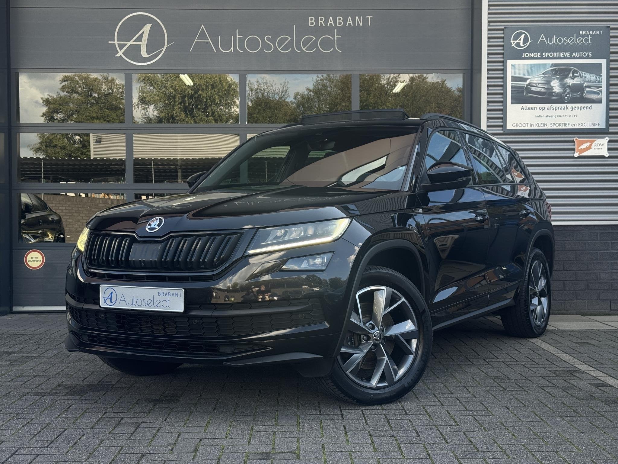 Skoda Kodiaq 2.0 TSI 4x4 Sportline Pano | Camera | 190PK, Auto's, Automaat, 1984 cc, Alcantara, Zwart