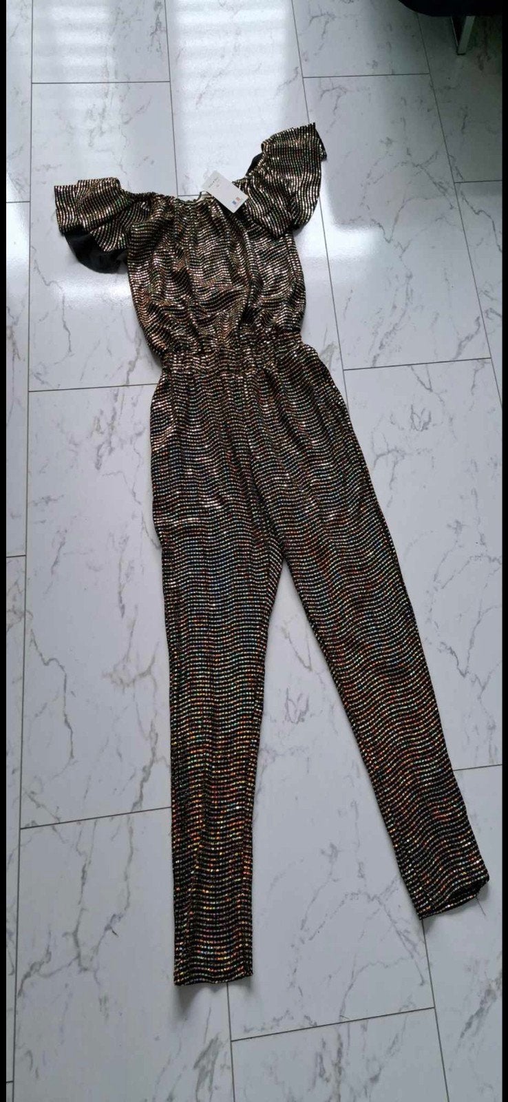 Glitzy jumpsuit met open schouders, Kleding | Dames, Jumpsuits, Nieuw, Maat 38/40 (M), Meerkleurig, Ophalen of Verzenden