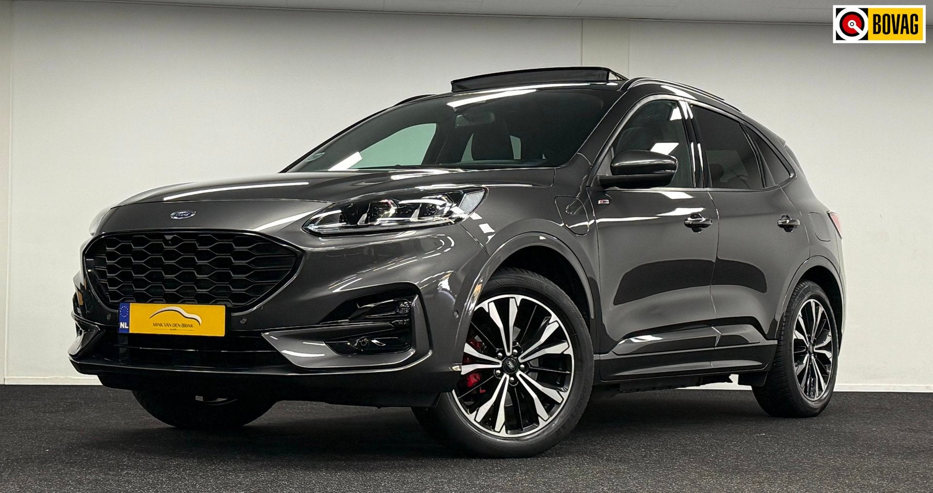 Ford Kuga 2.5 PHEV ST-Line X*224PK*Panodak*Trekhaak*B&O*19'', Auto's, Gebruikt, Zwart, 4 cilinders, Verwarmde buitenspiegels