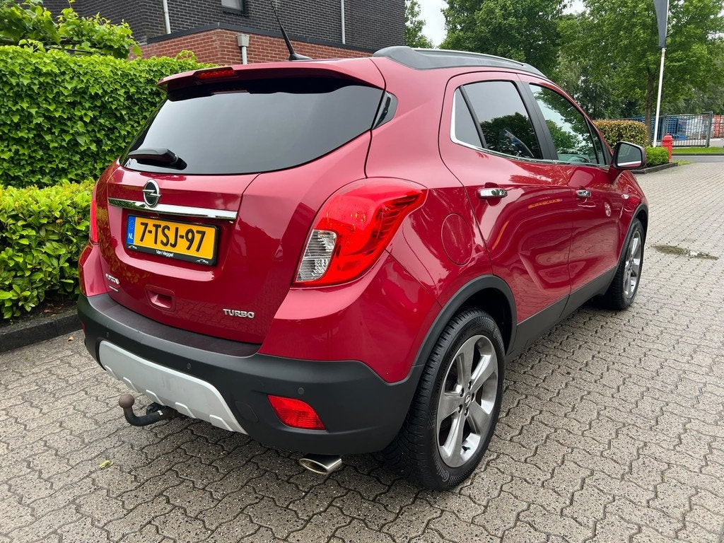 Opel Mokka 1.4 T Cosmo camera, trekhaak, cruise, airco, Voorwielaandrijving, Euro 5, Gebruikt, Zwart