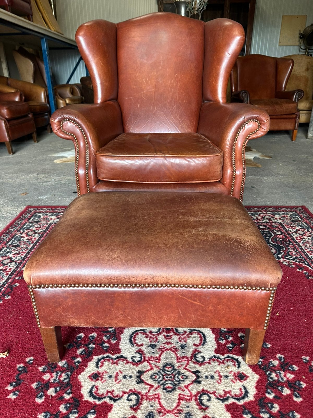 Royale leren oorfauteuil met hocker. Merk Bendic., Huis en Inrichting, Fauteuils, Ophalen, Gebruikt, ., Chesterfield