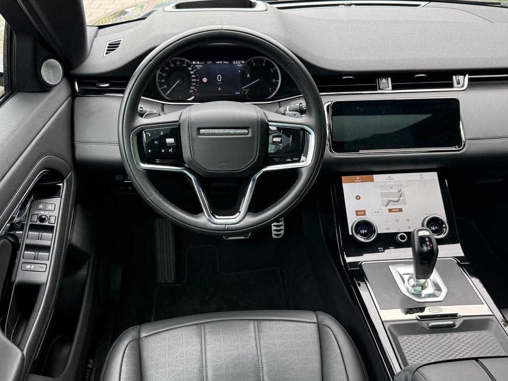 Land Rover Range Rover Evoque 1.5 P300e AWD R-Dynamic HSE |, Auto's, Land Rover, Automaat, 309 pk, Stof, 15 kWh