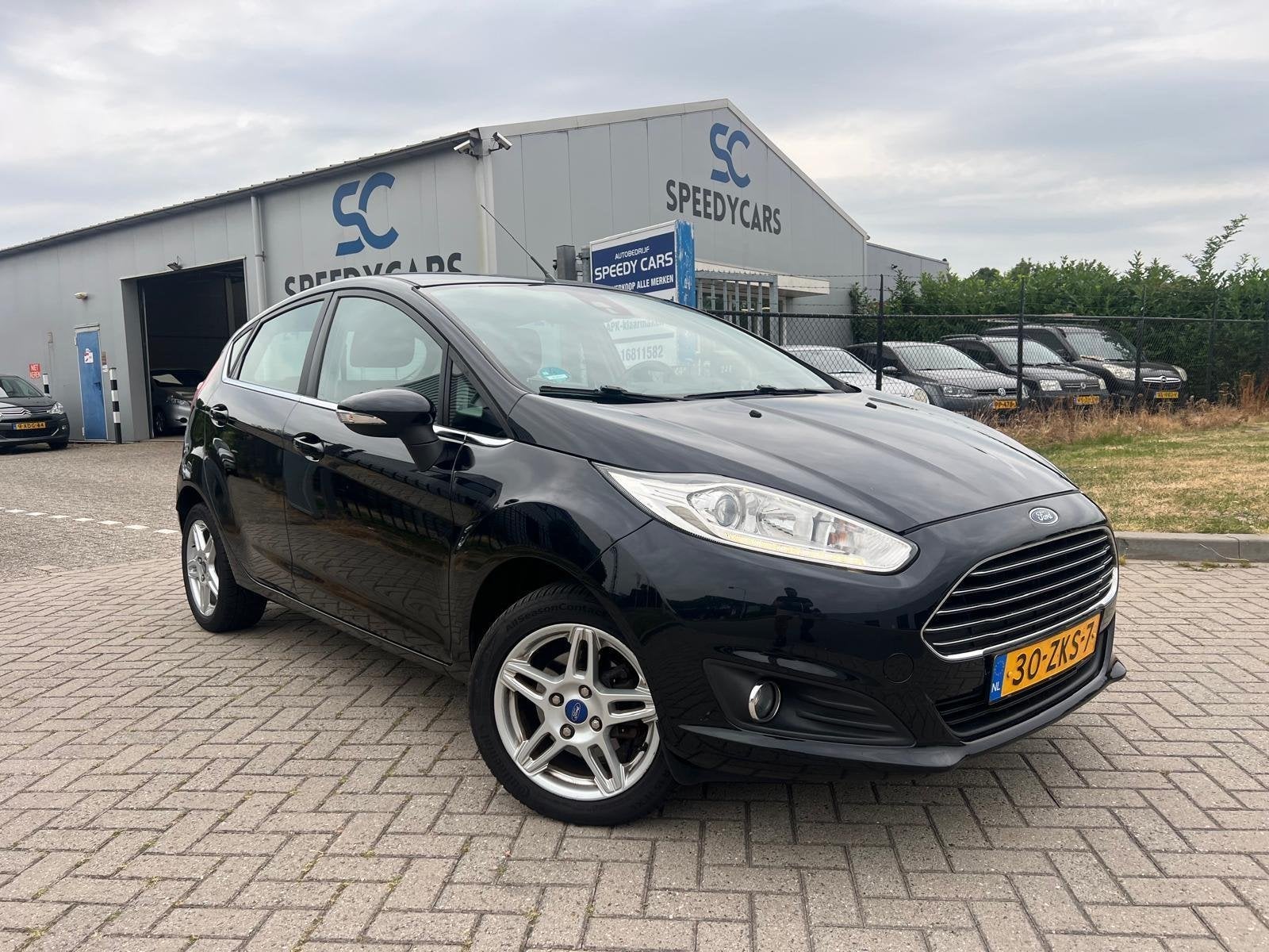 Ford Fiesta 1.0 EcoBoost Titanium 5DRS Cruise Clima PDC, Voorwielaandrijving, Euro 5, Zwart, Handgeschakeld