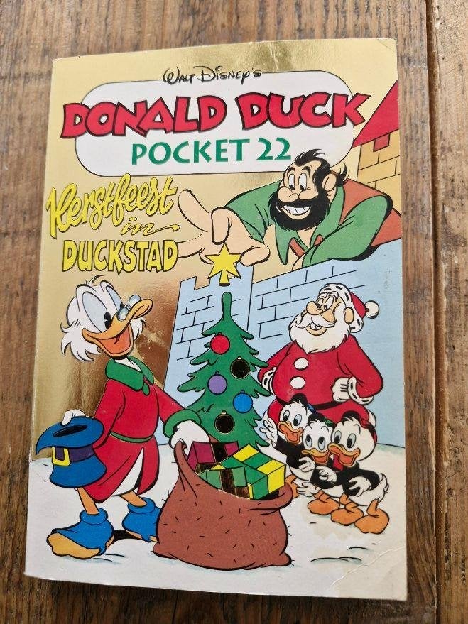 Donald Duck Pocket 22 – Kerstfeest in Duckstad eerste druk, Boeken, Fictie algemeen, Walt Disney, Ophalen of Verzenden, Zo goed als nieuw