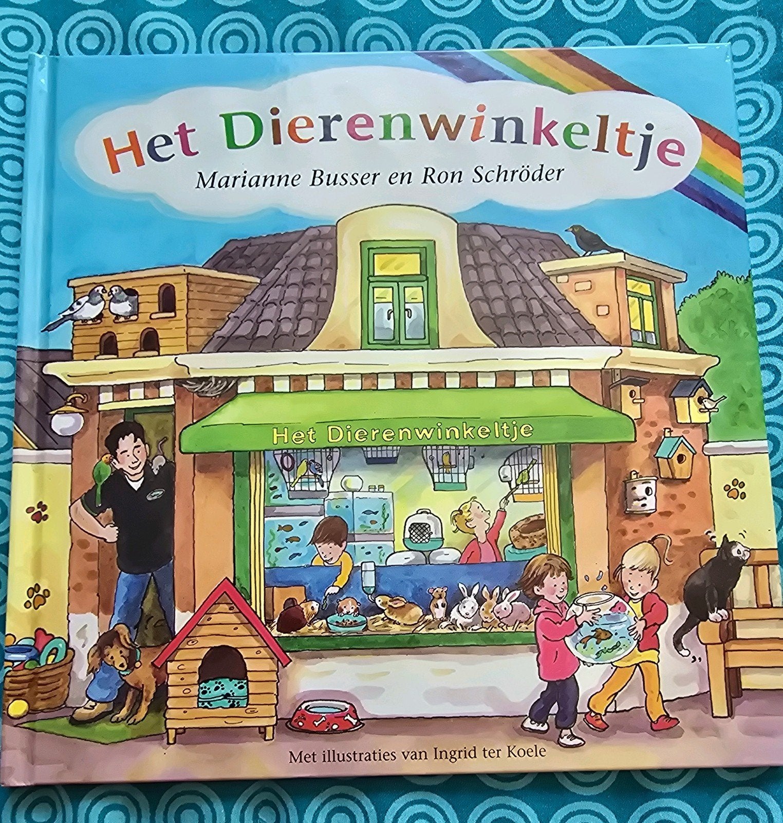 Het Dierenwinkeltje - Marianne Busser & Ron Schröder, Fictie algemeen, Ophalen of Verzenden, Zo goed als nieuw, Voorleesboek