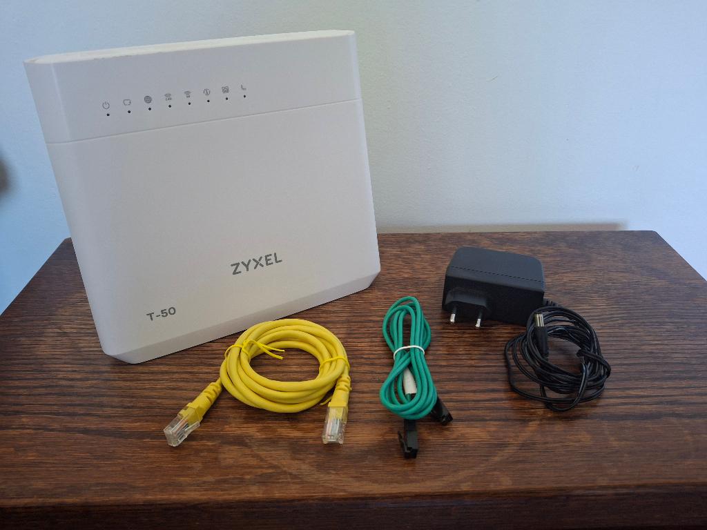 Zyxel T50 modem/router, Ophalen of Verzenden, Gebruikt, Router met modem, Zyxel