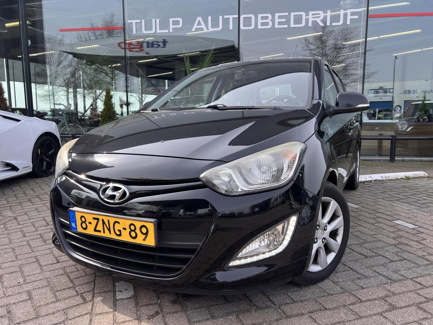 Hyundai i20 1.2i i-Deal 5Deurs Airco Radio/CD/Bluetooth, Auto's, Euro 5, Gebruikt, 4 cilinders, Zwart