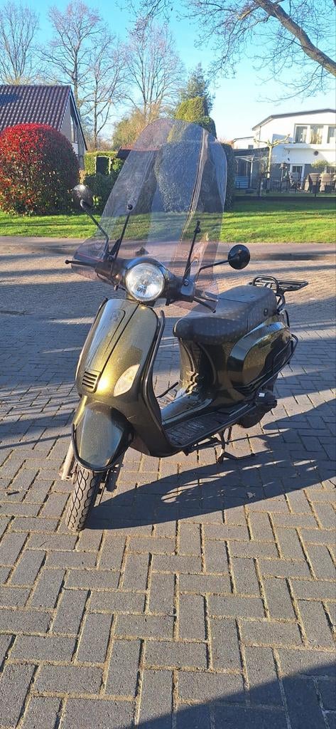 Mooie Agm vx50.    8256km, Ophalen of Verzenden, Benzine