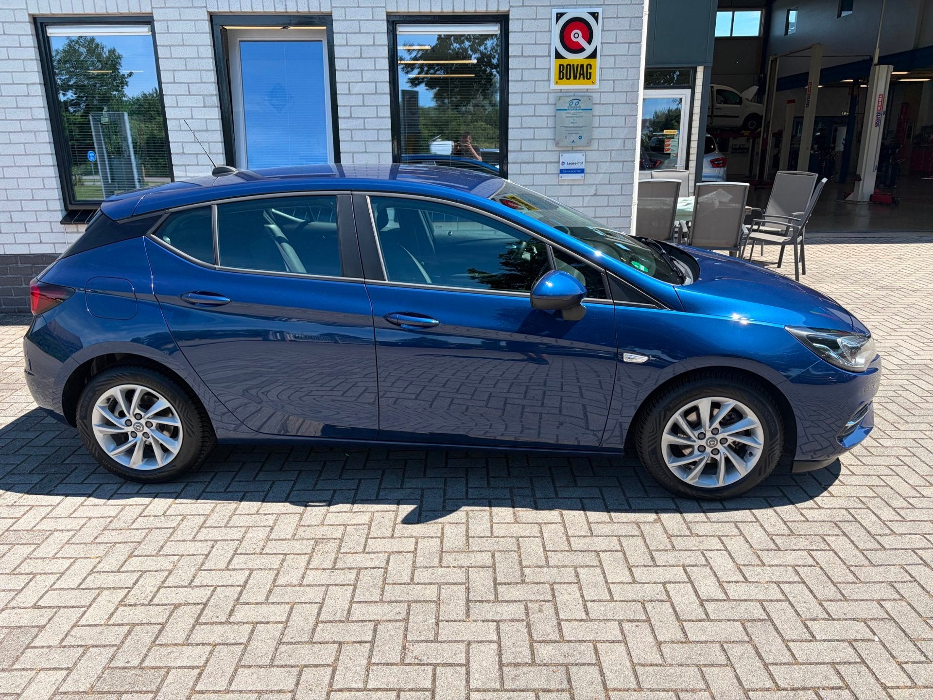 Opel Astra 1.2 Edition / Carplay / Camera / Cruise Control /, Auto's, Stof, Gebruikt, Blauw, 620 kg
