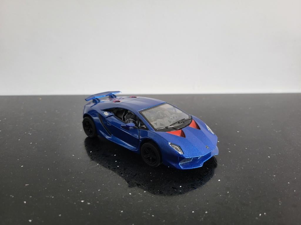 Lamborghini Sesto Elemento blauw 1/36 Kinsmart, Ophalen of Verzenden, Zo goed als nieuw, Auto