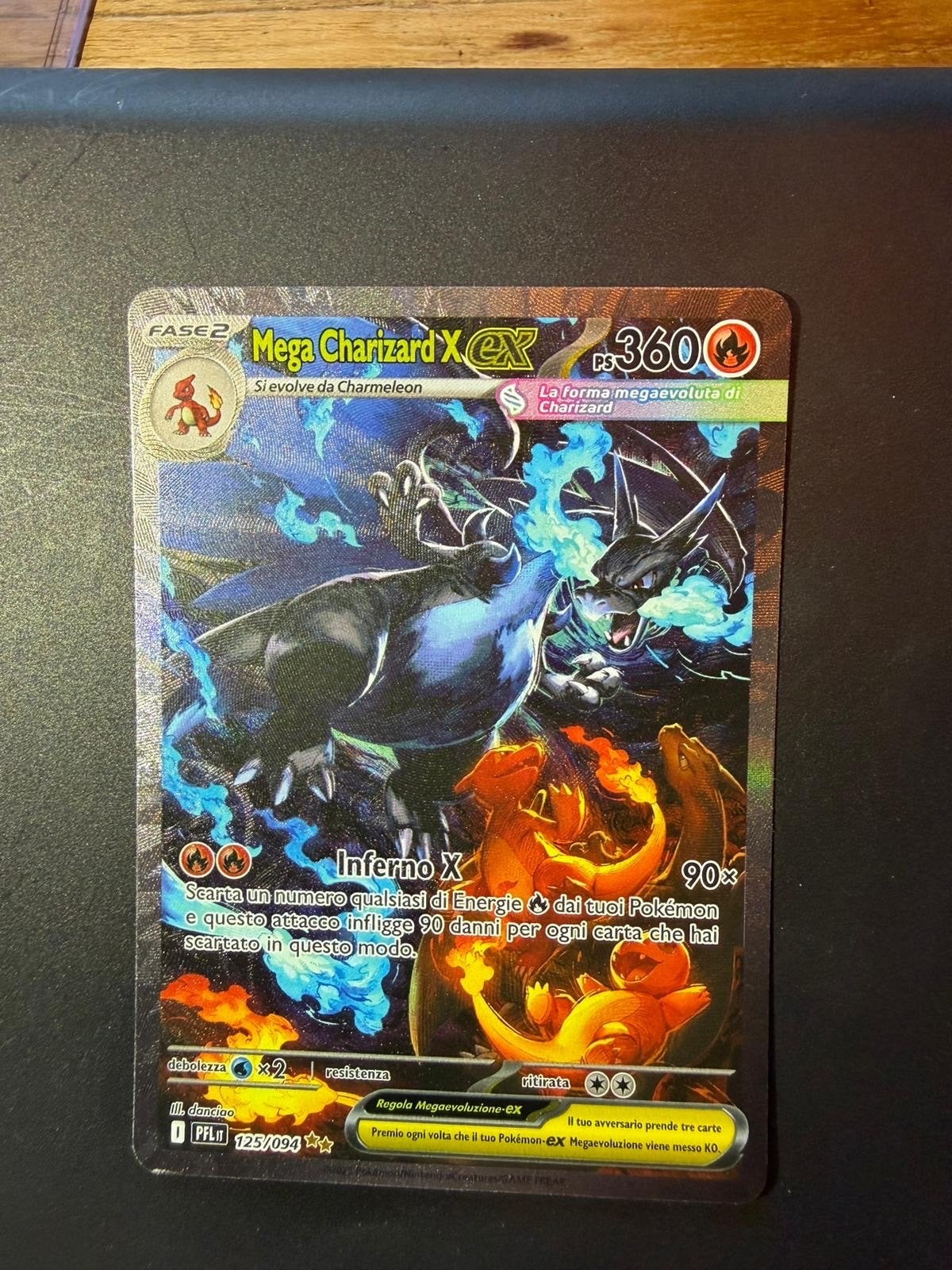 Mega Charizard X ex 125/094 – Italiaans – Near Mint, Ophalen of Verzenden, Zo goed als nieuw, Losse kaart, Foil