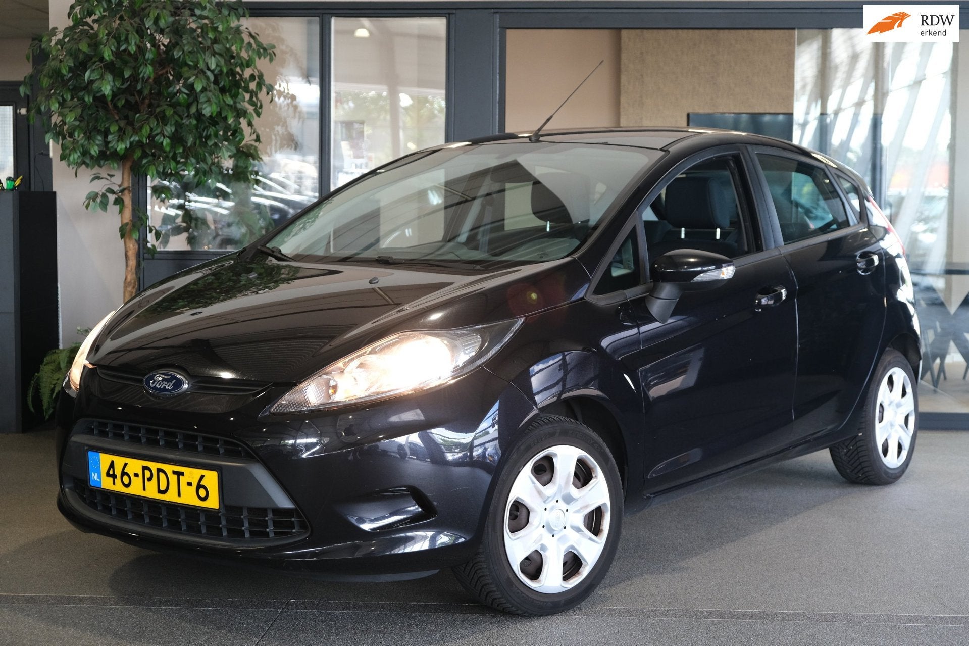 Ford Fiesta 1.25 Limited 60PK Airco, Auto's, Ford, Voorwielaandrijving, Euro 5, Stof, 4 cilinders