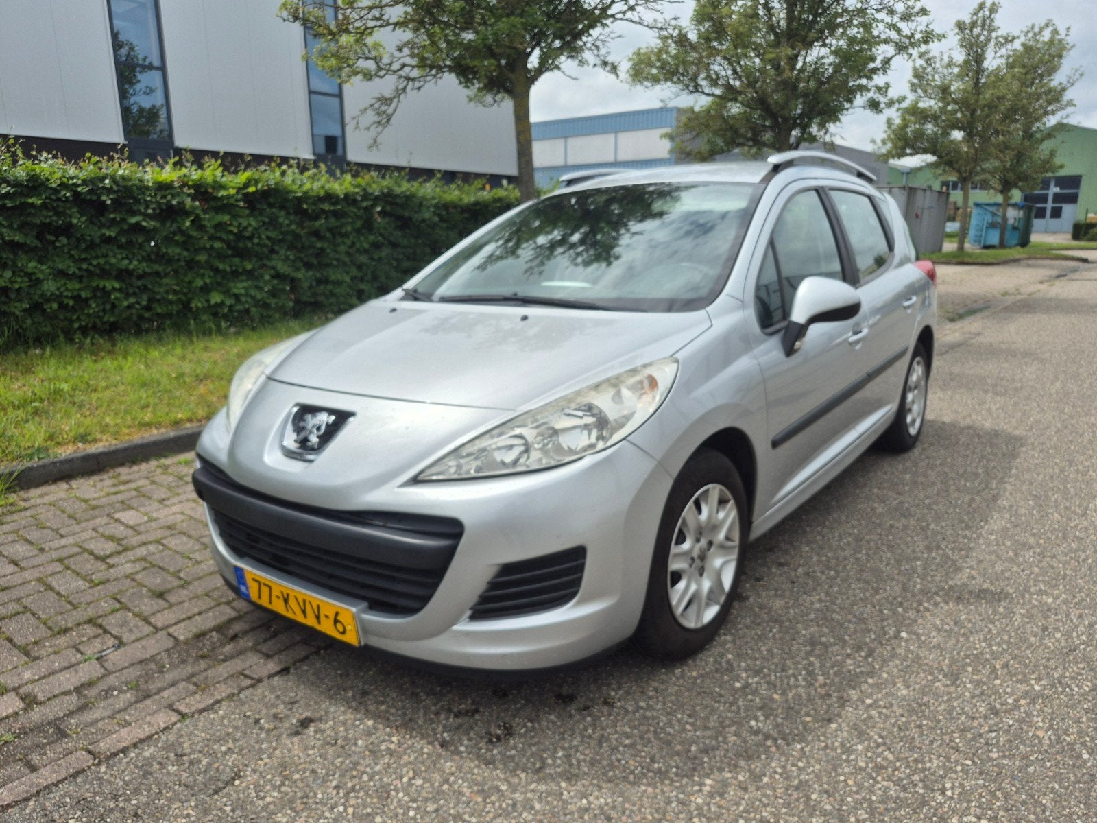 Peugeot 207 1.4 95pk 2010 Grijs, Auto's, Voorwielaandrijving, Adaptieve lichten, Leder en Stof, Origineel Nederlands