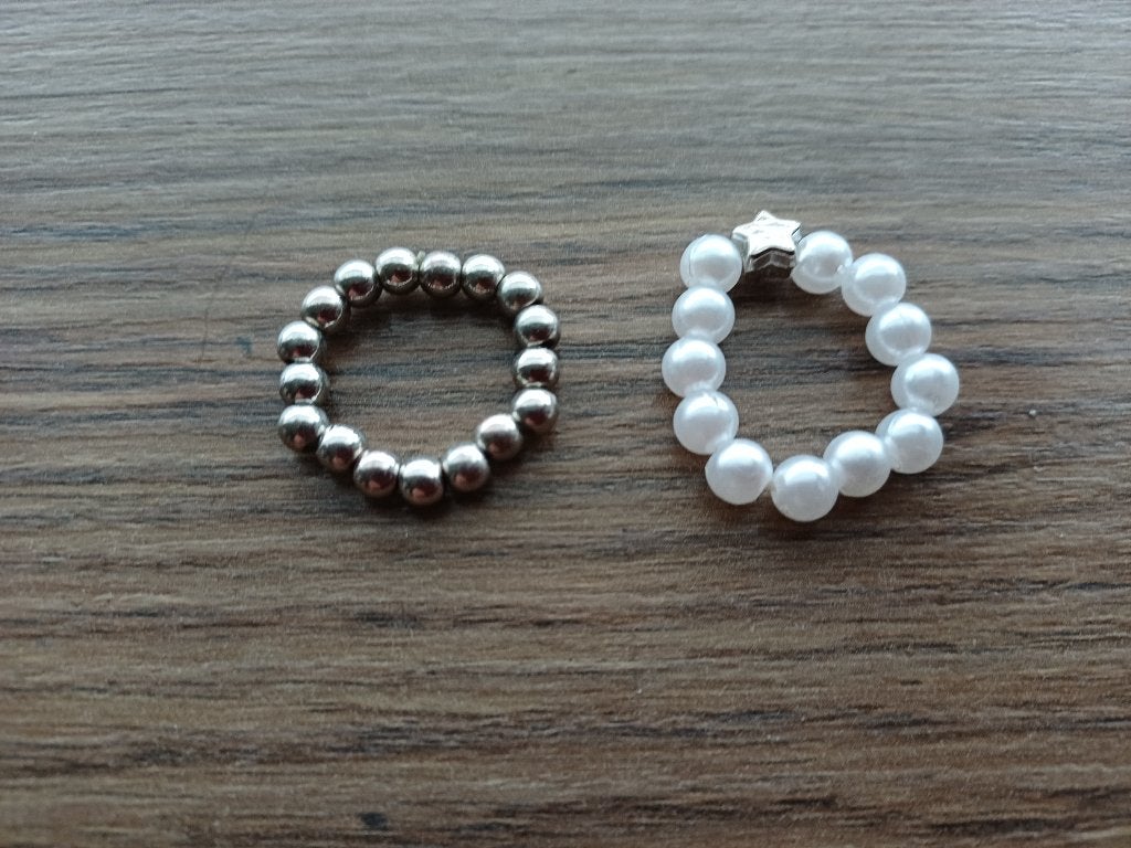 Nieuwstaat 2 nepparel ringen, Overige kleuren, Ophalen of Verzenden, Zo goed als nieuw, 17 tot 18