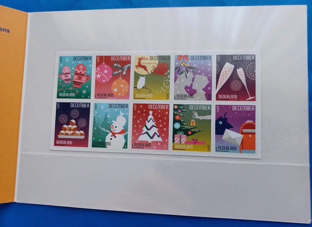 Postzegelmapje 512 A & B - Decemberzegels 2014, Postzegels en Munten, Postzegels | Nederland, Ophalen of Verzenden, Na 1940, Postfris