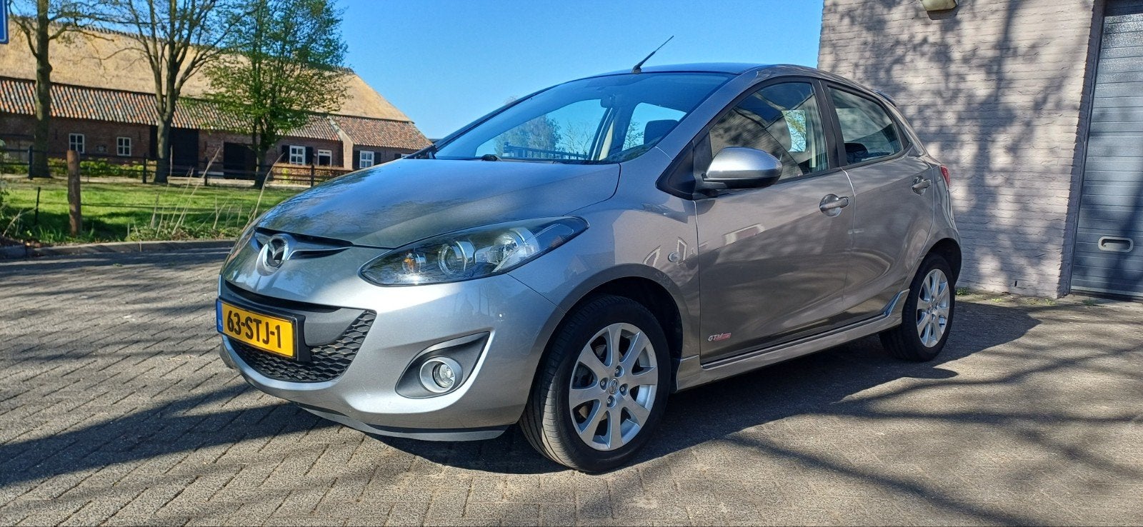 Mazda 2 1.3 62KW 5-DRS 2011 Grijs tekoop, Voorwielaandrijving, 31 €/maand, 4 cilinders, Origineel Nederlands