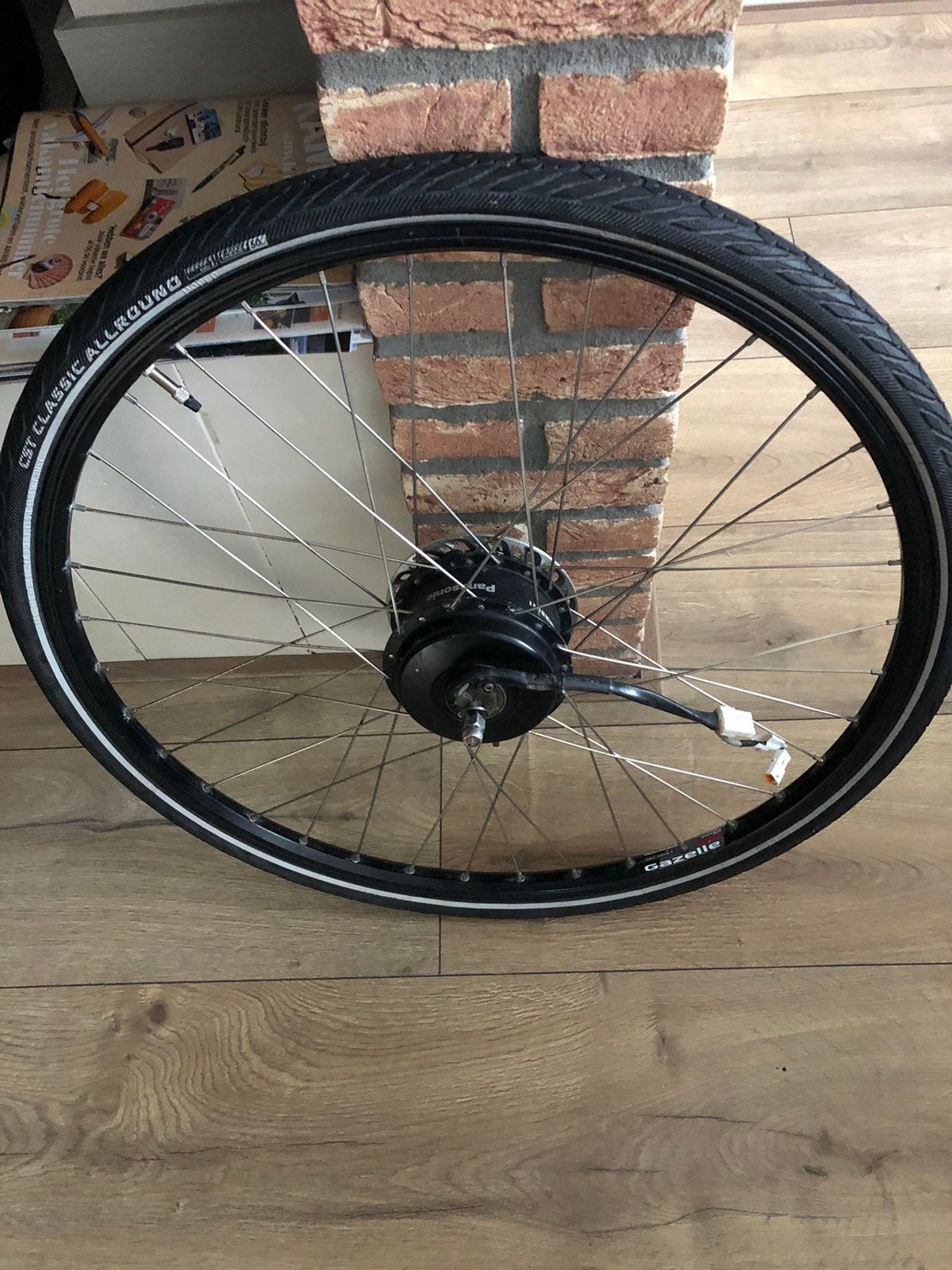 Gazelle voorwielmotor Panasonic, Fietsen en Brommers, Ophalen of Verzenden, Zo goed als nieuw, Band