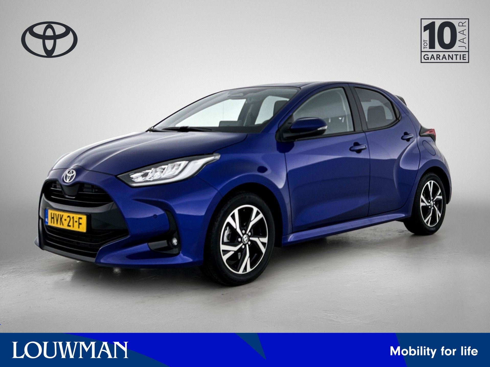 Toyota Yaris 1.5 Hybrid 115 Dynamic Comfort Pack | BTW voert, 12 maanden, Gebruikt, Blauw, Hybride Elektrisch/Benzine