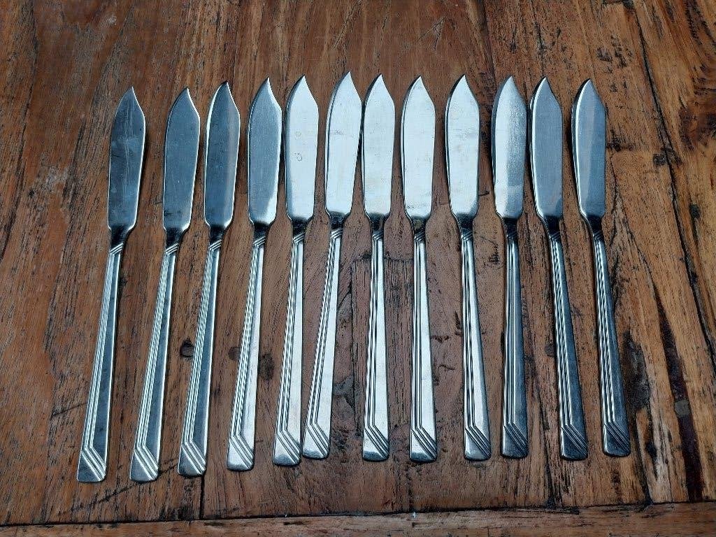 12 vis messen merk Nivella, Ophalen, Los bestek, Zo goed als nieuw, Rvs of Chroom
