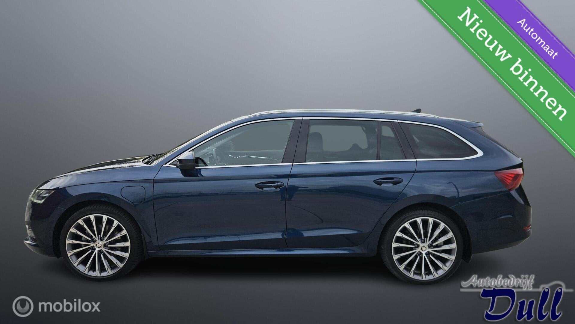 Skoda Octavia Combi 1.4 TSI DSG Business Edition Plus PANO!, Auto's, Gebruikt, Euro 6, Met garantie (alle), Blauw