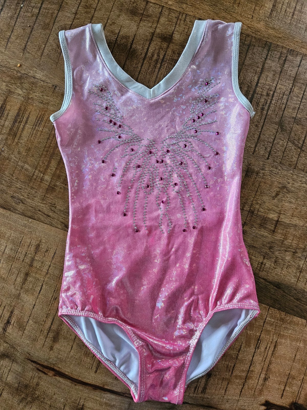 Roze turnpakje met glitters voor 6-7 jaar, Sport en Fitness, Ophalen of Verzenden