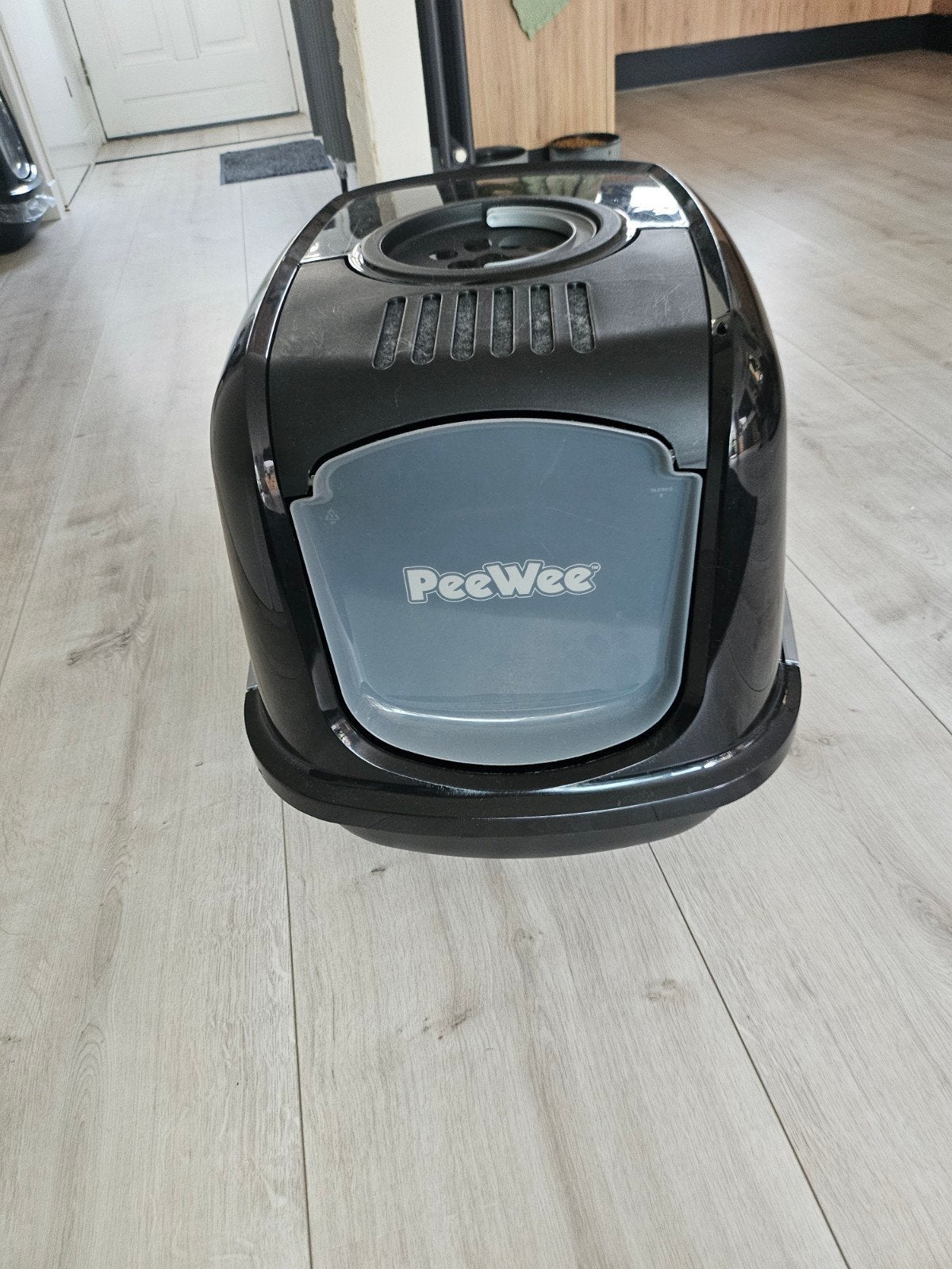 peewee kattenbak, Ophalen
