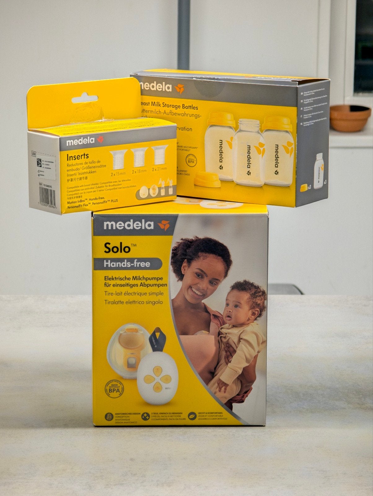 Medela Solo Hands-free kolfset met accessoires, Kinderen en Baby's, Ophalen of Verzenden, Zo goed als nieuw