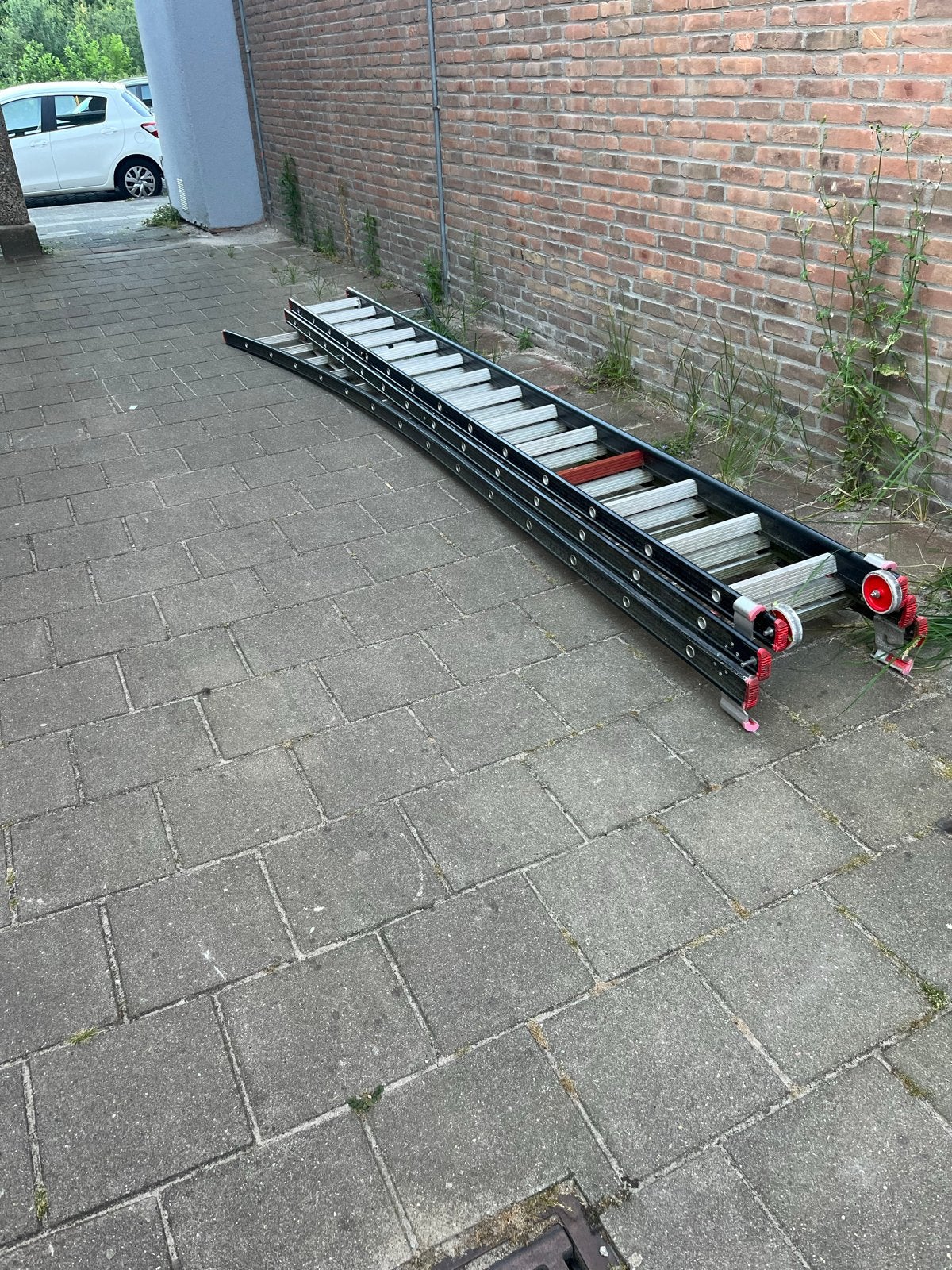 Stevige uitschuifbare ladder - 4 meter of meer, Doe-het-zelf en Verbouw, Ladders en Trappen, Ophalen, Gebruikt, Ladder, Opvouwbaar of Inschuifbaar