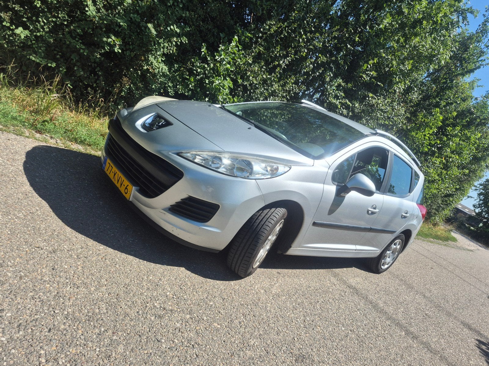 Te koop aangeboden: nette Peugeot 207 SW 1.4 VTi  benzine, Voorwielaandrijving, Stof, Zwart, Origineel Nederlands