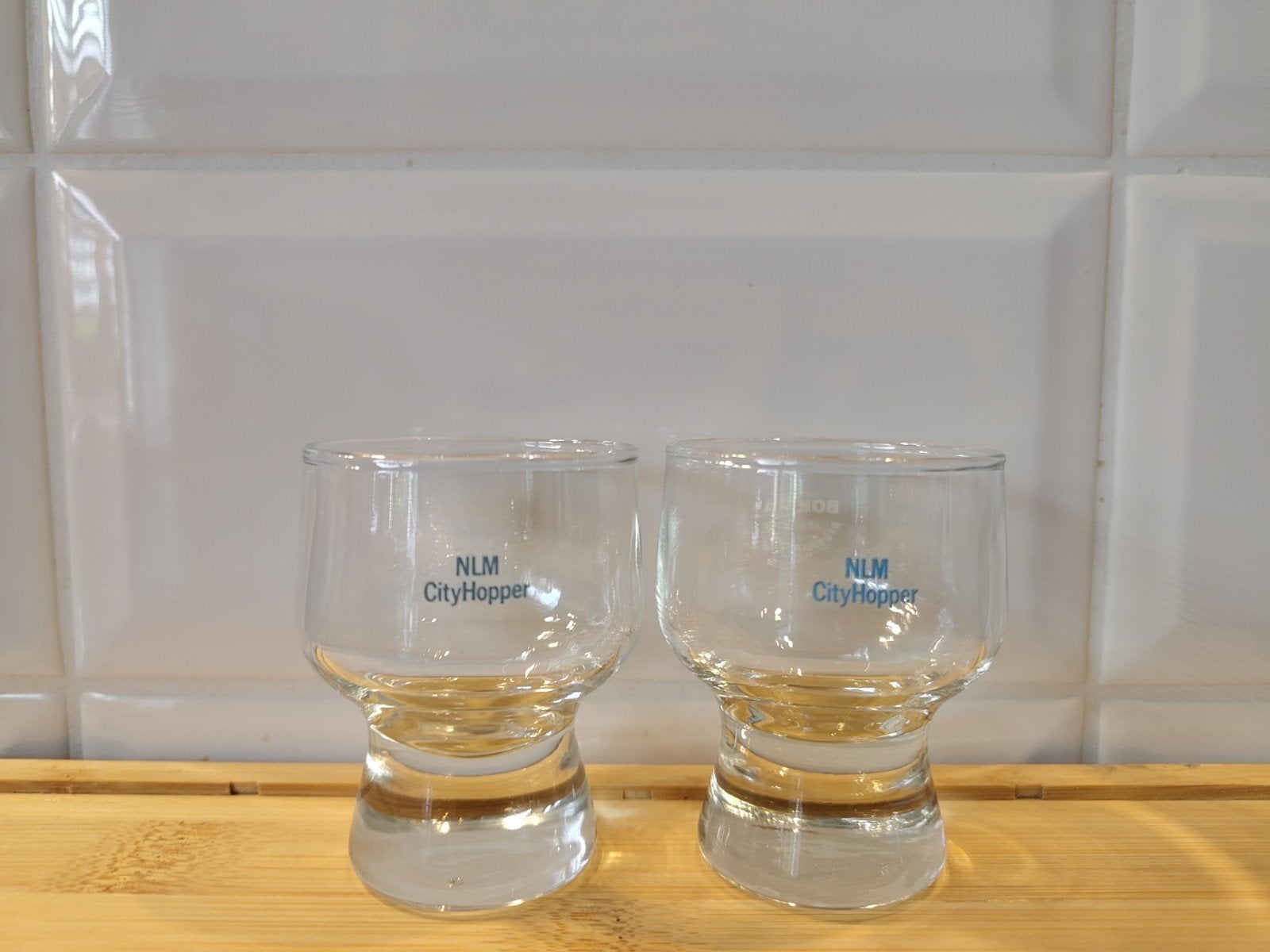 NLM Cityhopper Bokma borrelglaasjes -  KLM verzamelaars, Ophalen of Verzenden, Zo goed als nieuw, Borrel- of Shotglas