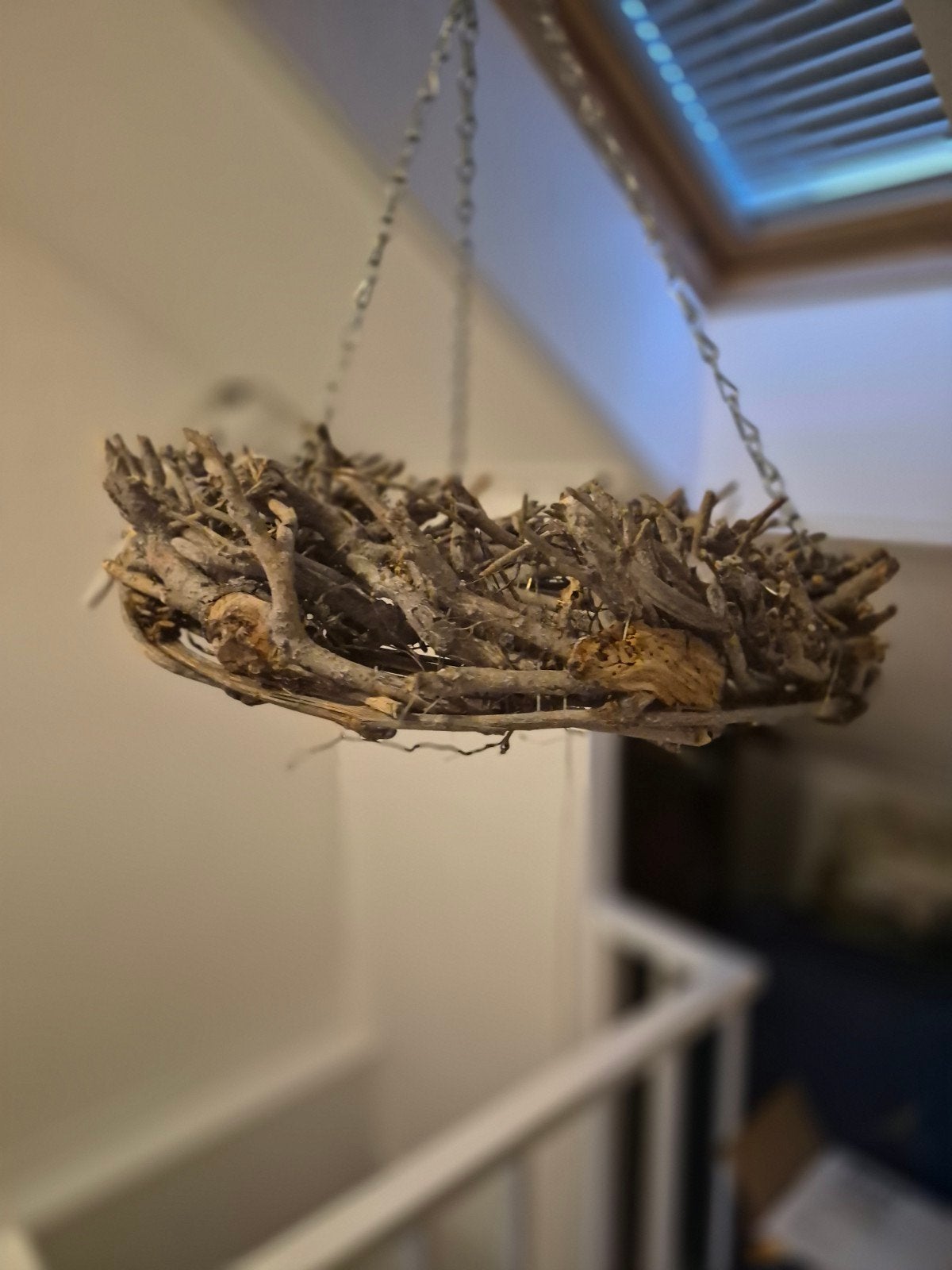 hangkrans van hout, Ophalen