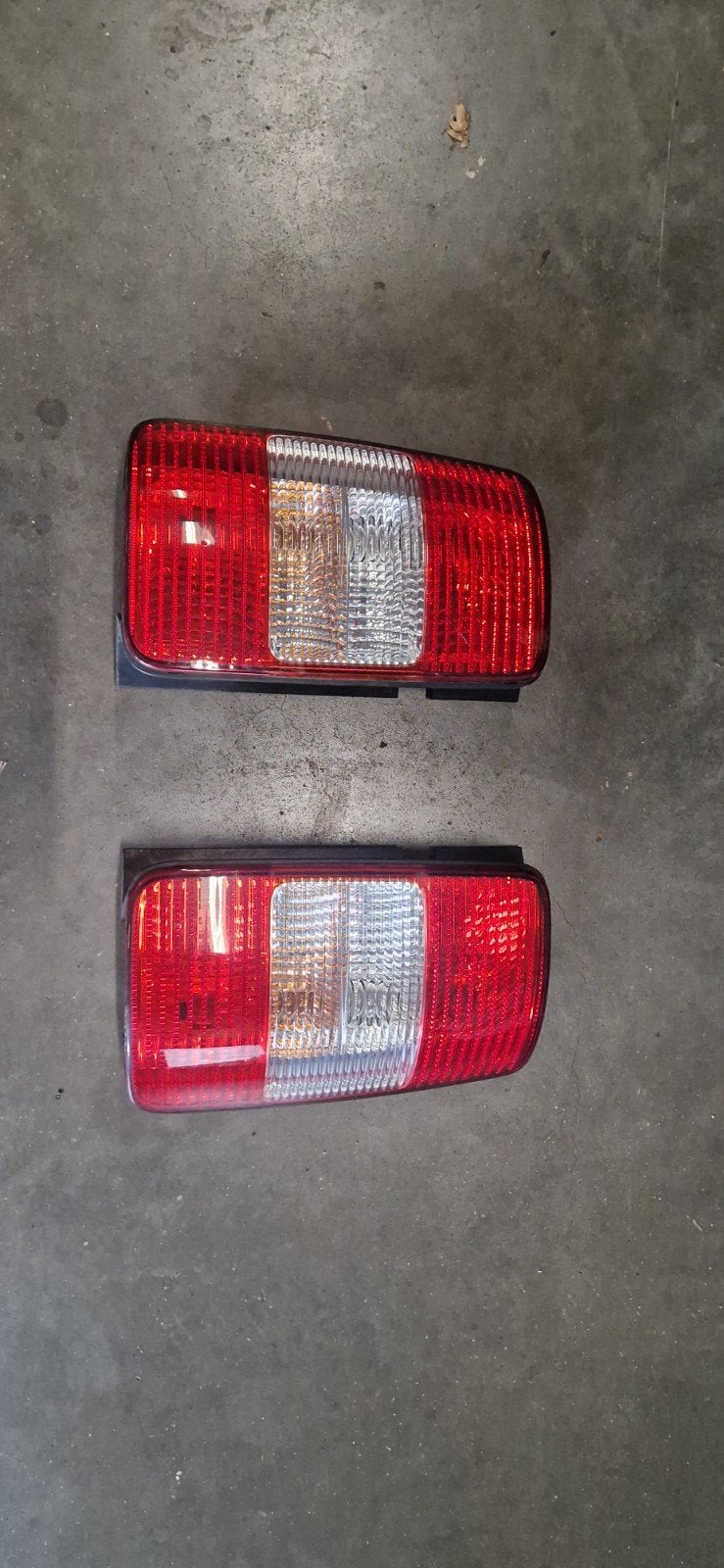 VW Caddy MK3 Achterlichten Origineel met Lamphouders, Auto-onderdelen, Ophalen of Verzenden, Gebruikt, Volkswagen