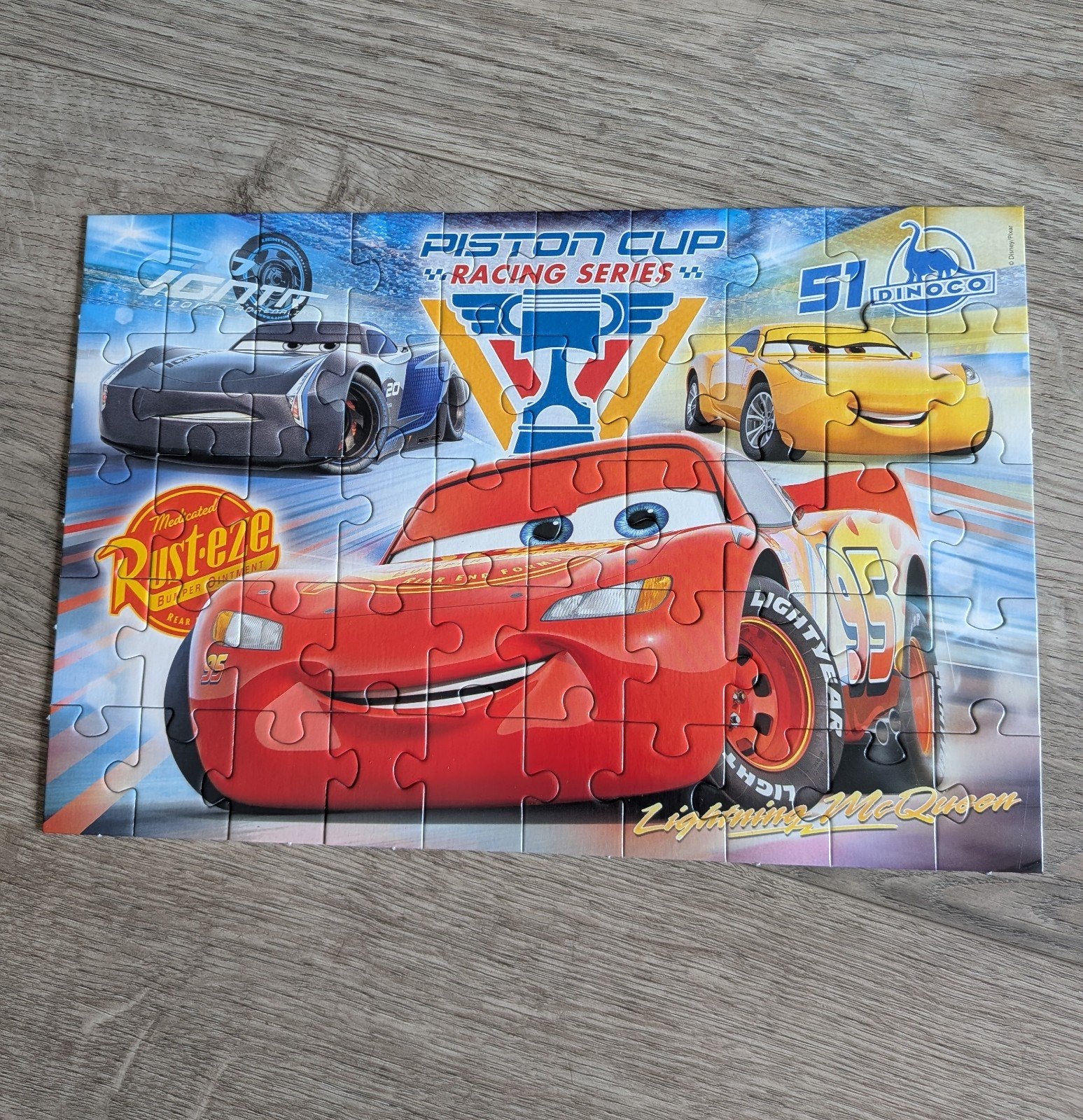 Disney Pixar Cars Piston Cup Racing Series puzzel 50 stukjes, Ophalen of Verzenden, 10 tot 50 stukjes, Zo goed als nieuw, 4 tot 6 jaar